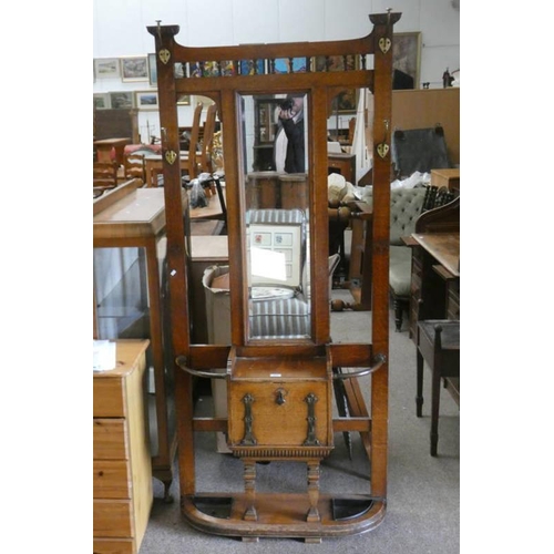 507 - 20TH CENTURY OAK MIRROR BACK HALLSTAND WITH FALL FRONT PANEL DOOR, 191CM TALL