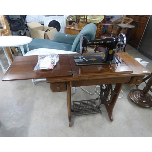 62 - MAHOGANY SINGER SEWING TABLE WITH FOLD-OUT MACHINE ON TREADLE BASE, MACHINE NO.EC600618