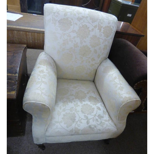 76 - EARLY 20TH CENTURY OVERSTUFFED ARMCHAIR ON SQUARE TAPERED SUPPORTS