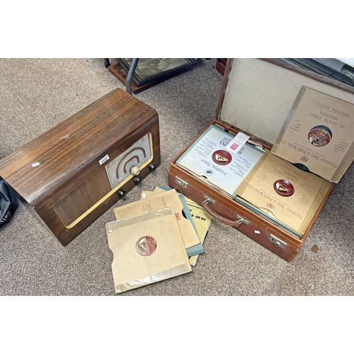 1133 - MICHAEL RADIO LTD RADIO AND A SELECTION OF RECORDS IN A LEATHER CASE