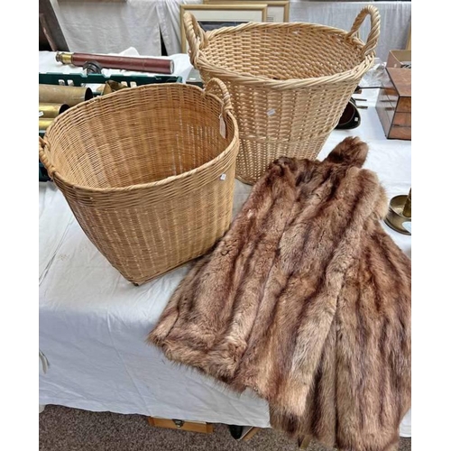 1145 - TWO WICKER BASKETS AND A FUR JACKET