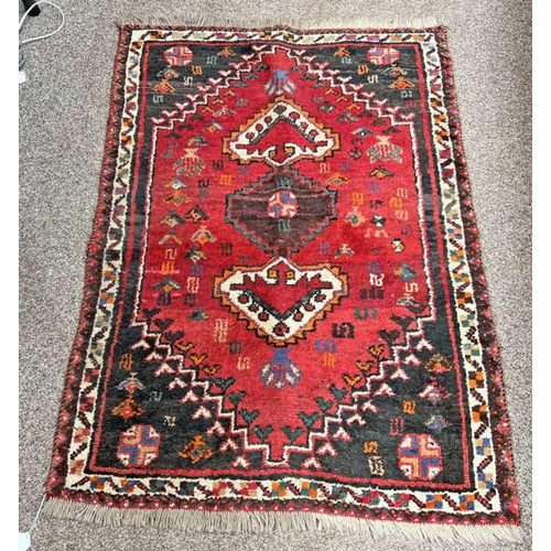 1157 - RED MIDDLE EASTERN RUG.  115 CM X 86 CM