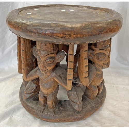 1302 - YORUBU CARVED WOODEN STOOL BODY WITH MALE FIGURES, 32CM TALL