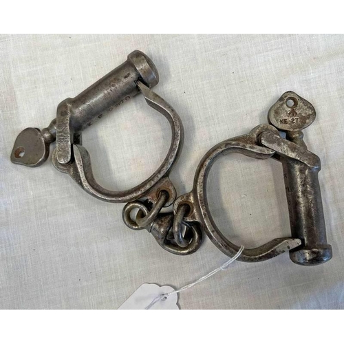 1330 - BRITISH MILITARY ISSUE DARBY STYLE NON-ADJUSTABLE HANDCUFFS WITH 2 KEYS, EACH STAMPED WITH BROAD ARR... 