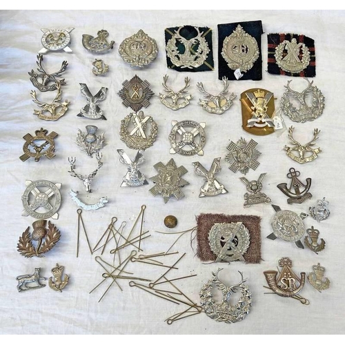 1334 - LARGE SELECTION OF VARIOUS SCOTTISH REGIMENT CAP BADGES TO INCLUDE THE ROYAL SCOTS, ARGYLL AND SUTHE... 