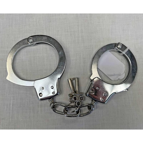 1336 - PAIR OF SMITH FARGO TEXAS HANDCUFFS WITH KEYS