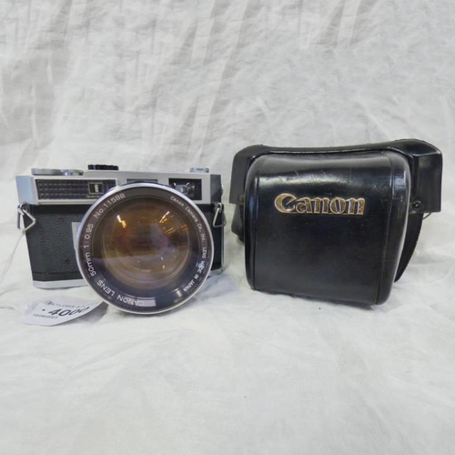 4000 - CANON MODEL 7  35 MM CAMERA BODY NO 853960 WITH CANON LENS 50 MM, 1:0.95  NO 11588 WITH CANON 72 MM ... 