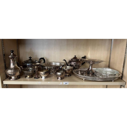 697 - SELECTION OF SILVER PLATED WARE TO INCLUDE TAZZA TEASET, TRAY ETC OVER ONE SHELF