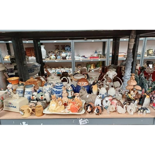 3230 - SELECTION OF PORCELAIN, PENGUINS, PORCELAIN TEAPOTS, ETC OVER 1 SHELF