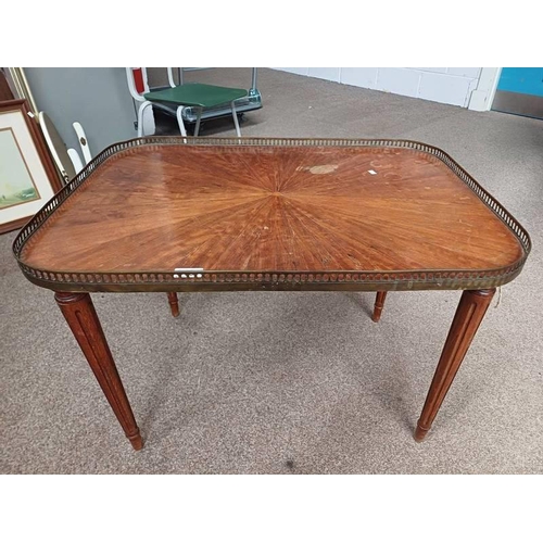 33 - 20TH CENTURY MAHOGANY TRAY TABLE WITH DECORATIVE BRASS GALLERY ON REEDED SUPPORTS.  54 CM TALL X 75 ... 