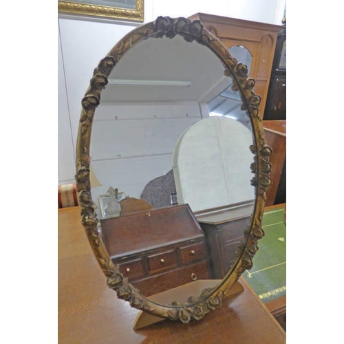 511 - OVAL GILT MIRROR WITH DECORATIVE FRAME ON STAND