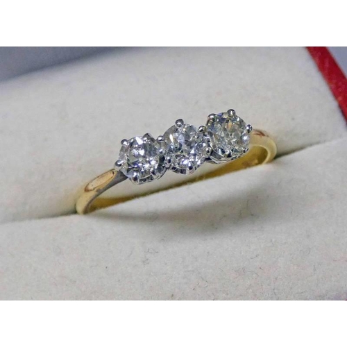 13 - DIAMOND SET 3 STONE RING MARKED 18CT, THE DIAMONDS APPROX 0.75 CARATS IN TOTAL