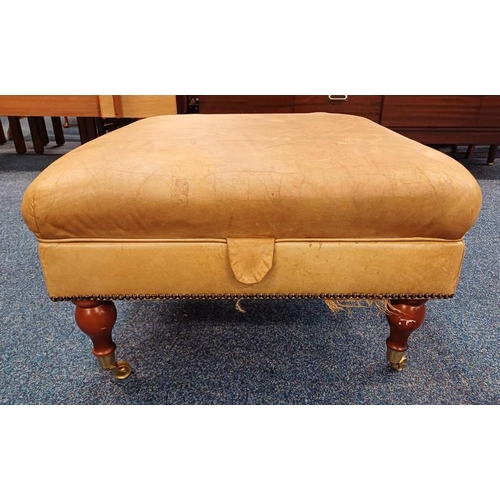 5039 - TAN LEATHER CENTRE STOOL WITH LIFT UP TOP ON TURNED SUPPORTS . 41 CM TALL X 70 CM WIDE