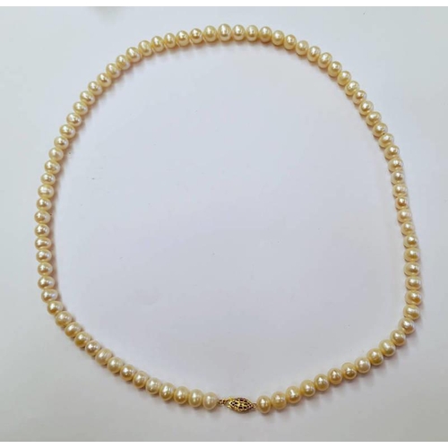 85 - CULTURED PEARL NECKLACE ON A YELLOW METAL CLASP, PEARLS 7.8 TO 9.6 MM - 64CM LONG