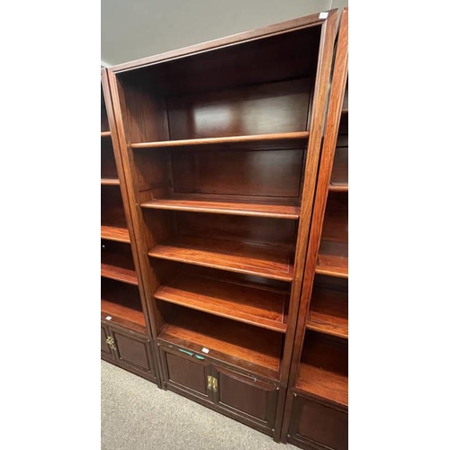 171 - ORIENTAL HARDWOOD OPEN BOOKCASE WITH SHELVES OVER 2 PANEL DOORS, 203CM TALL