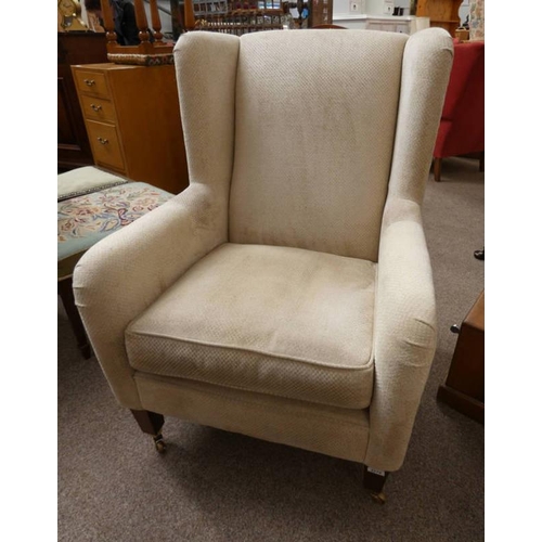 201 - OVERSTUFFED WINGBACK ARMCHAIR ON MAHOGANY SQUARE TAPERED SUPPORTS