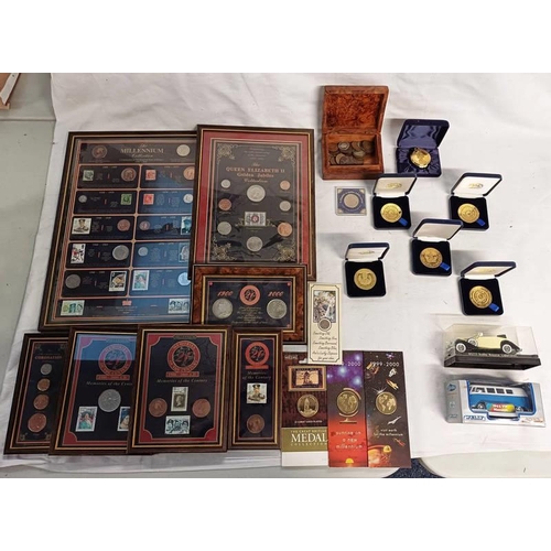 2415 - 7 FRAMED COIN SETS TO INCLUDE THE MILLENNIUM COLLECTION, 4 X MILLENNIUM MEMORIES OF THE 20TH CENTURY... 