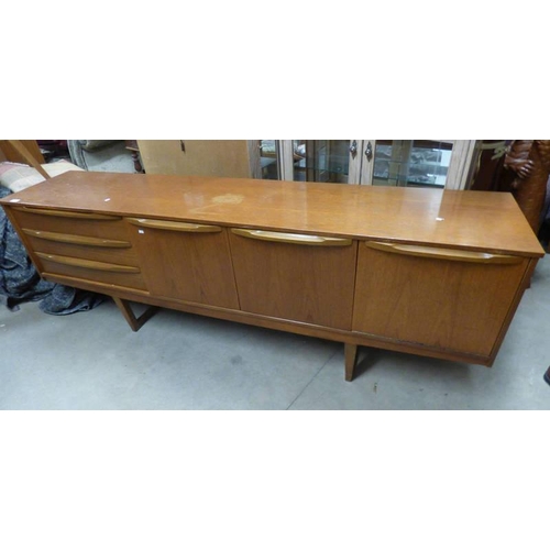 26 - TEAK SIDEBOARD WITH 3 DRAWERS, 2 PANEL DOORS & FALL FRONT PANEL DOOR.  205 CM LONG