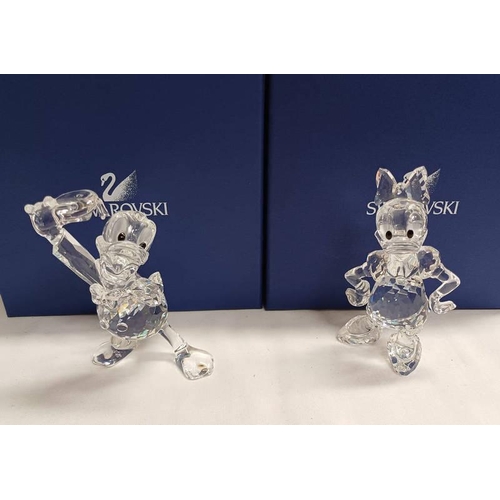 3055 - 2 BOXED SWAROVSKI CRYSTAL DISNEY SHOWCASE FIGURES; DONALD & DAISY DUCK