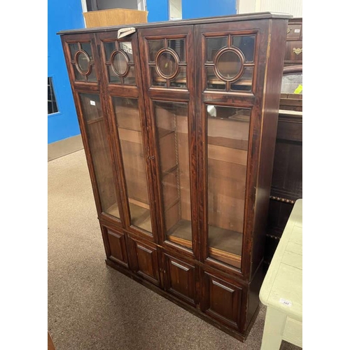 33 - LATE 19TH/EARLY 20TH CENTURY MAHOGANY 2 DOOR GLAZED BOOKCASE OVER 2 PANEL DOORS ON A PLINTH BASE - 1... 