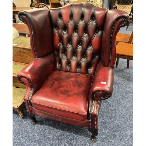 36 - RED LEATHERETTE BUTTONBACK WING BACK ARMCHAIR ON SHORT CABRIOLE SUPPORTS - 105CM TALL