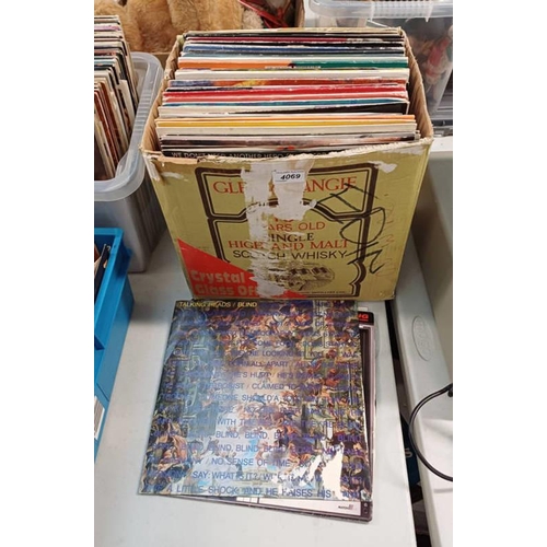 4069 - SELECTION OF VARIOUS VINYL RECORDS INCLUDING ARTIST SUCH AS SIMPLE MINDS, DIRE STRAITS, TALKING HEAD... 