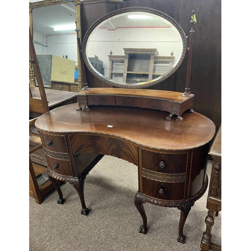 53 - MAHOGANY KIDNEY SHAPED DRESSING TABLE WITH OVAL SWING MIRROR BETWEEN REEDED COLUMNS ON 3 SHORT DRAWE... 