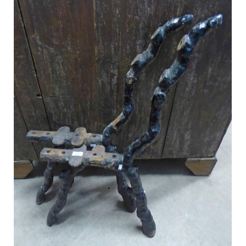 6005 - PAIR OF PAINTED CAST IRON BENCH ENDS.