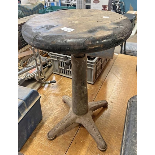 6040 - SINGER SEWING MACHINE STOOL WITH WOODEN TOP AND CAST METAL BASE EMBOSSED ''SINGER''