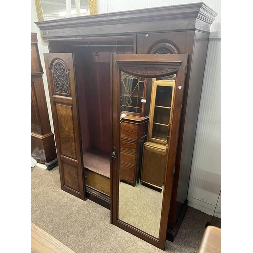 68 - 19TH CENTURY WALNUT WARDROBE WITH CENTRALLY SET MIRROR DOOR FLANKED EACH SIDE BY 2 PANEL DOORS ON PL... 