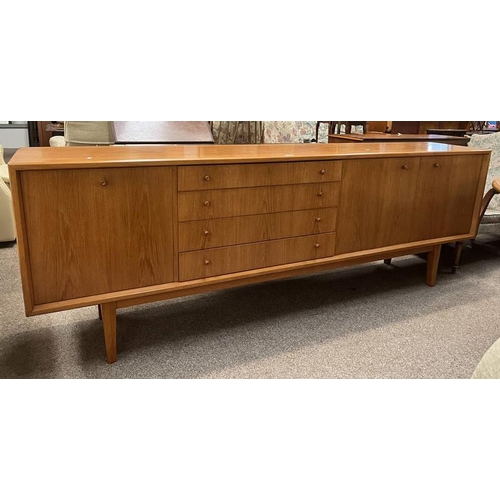 9 - TEAK SIDEBOARD WITH 4 DRAWERS & 3 PANEL DOORS ON TAPERED SUPPORTS, 236CM LONG