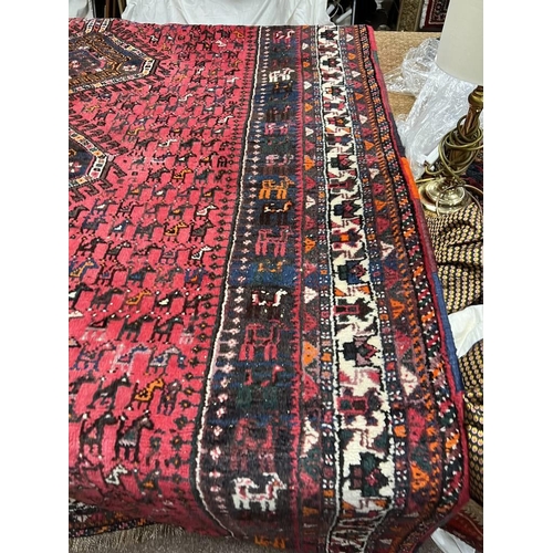 1427 - RED GROUND MIDDLE EASTERN CARPET WITH ANIMAL DESIGN 200 X 280CM