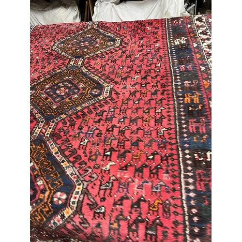 1427 - RED GROUND MIDDLE EASTERN CARPET WITH ANIMAL DESIGN 200 X 280CM