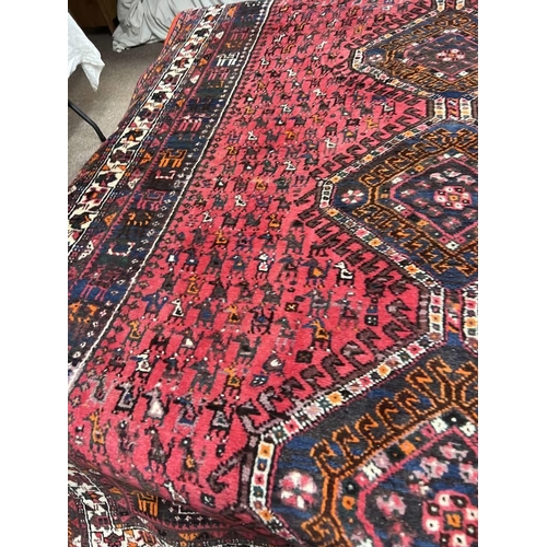 1427 - RED GROUND MIDDLE EASTERN CARPET WITH ANIMAL DESIGN 200 X 280CM