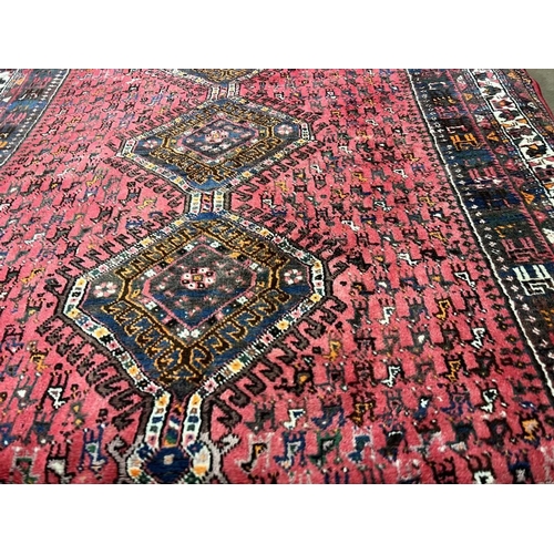 1427 - RED GROUND MIDDLE EASTERN CARPET WITH ANIMAL DESIGN 200 X 280CM