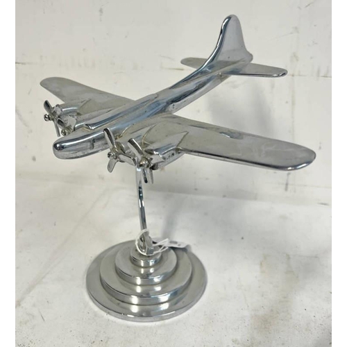 1004 - METAL MODEL OF A 4 PROPELLER AIR CRAFT ON STAND, 27.5 CM ACROSS