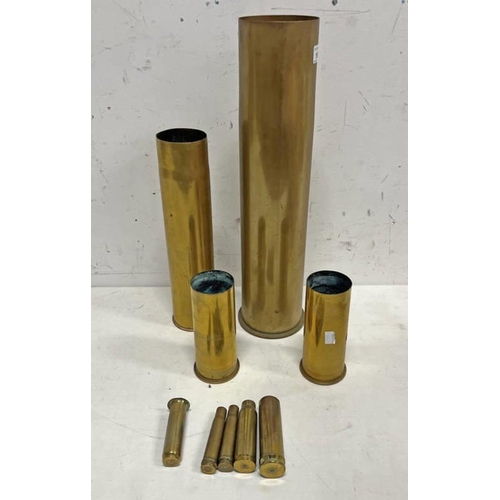 1028 - 2 WW1 GERMAN BRASS ARTILLERY SHELL CASES, TALLEST IS 50.5CM & 7 OTHER SHELL CASES