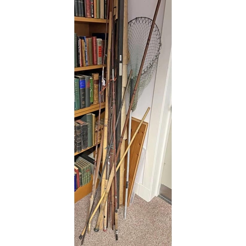 1075 - SELECTION OF VARIOUS FISHING RODS TO INCLUDE A GAFF AND A LANDING NET