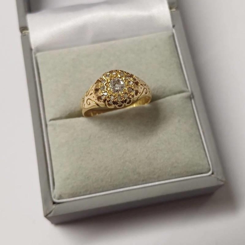 111 - EARLY 20TH CENTURY 18CT GOLD DIAMOND CLUSTER RING, THE CENTRAL ROUND CUT DIAMOND SET WITHIN A SURROU... 
