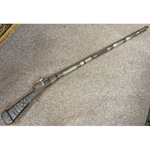1137 - MIDDLE EASTERN MATCH LOCK MUSKET WITH 101CM LONG TWO STAGE BARREL, DECORATIVE METAL BARREL BANDS & M... 
