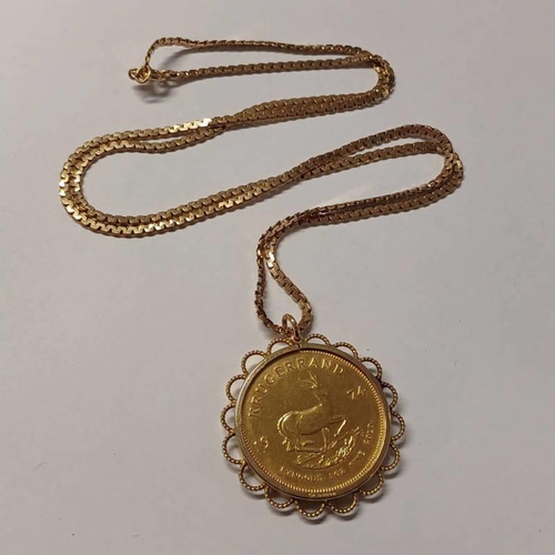 126 - 9CT GOLD MOUNTED 1974 KRUGERRAND ON A 9CT GOLD CHAIN - 55.0G TOTAL