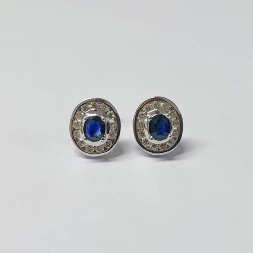142 - PAIR OF 18CT GOLD SAPPHIRE & DIAMOND CLUSTER EARSTUDS, DIAMONDS APPROX. 0.7 CARATS IN TOTAL