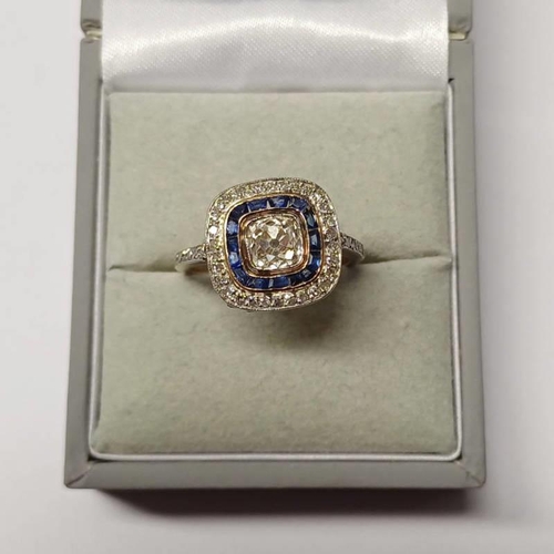 158 - ART DECO SAPPHIRE & DIAMOND SET RING, THE CENTRAL CUSHION SHAPED DIAMOND APPROX 0.8 CARATS SET WITHI... 