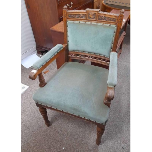 5078 - LATE 19TH CENTURY OAK OPEN ARMCHAIR WITH DECORATIVE CARVING ON TURNED SUPPORTS