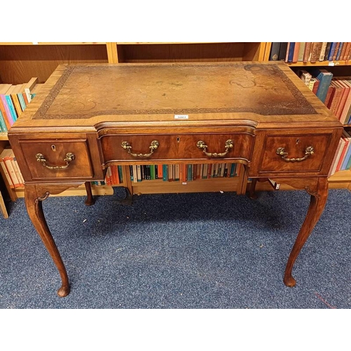 5081 - EARLY 20TH CENTURY LEATHER TOPPED WRITING TABLE WITH 3 DRAWERS & QUEEN ANNE SUPPORTS.  72 CM TALL X ... 
