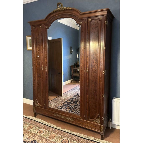 5104 - 19TH CENTURY STYLE CONTINENTAL TRIPLE DOOR ARMOIRE WITH GILT METAL ESCUTCHEONS & FITTED INTERIOR.  2... 