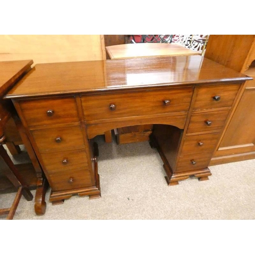 5168 - 19TH CENTURY MAHOGANY KNEE HOLE DESK WITH CENTRALLY SET DRAWER FLANKED BY 2 SETS OF 4 DRAWERS.  LENG... 
