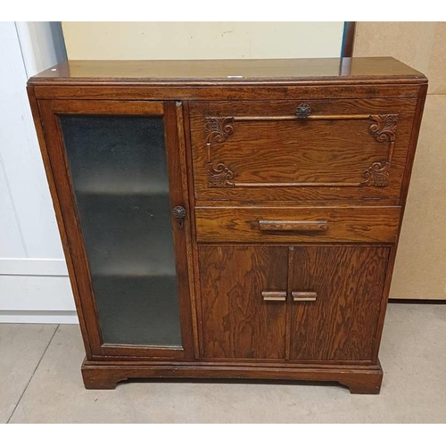 5232 - MID 20TH CENTURY OAK BOOKCASE WITH FALL PANEL DOOR OPENING TO SHELVED INTERIOR OVER DRAWER & 2 PANEL... 