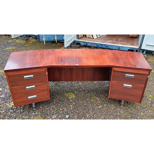 5445 - HARDWOOD DESK WITH SHAPED TOP & 5 DRAWERS ON SQUARE CHROME SUPPORTS.  72 CM TALL X 215 CM WIDE