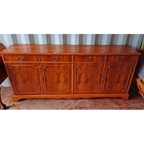 5453 - YEW WOOD SIDEBOARD WITH 4 DRAWERS OVER 4 PANEL DOORS.  88 CM TALL X 197.5 CM LONG.